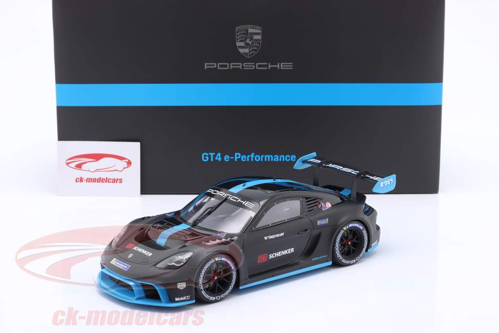 Porsche 718 Cayman GT4 e-Performance 2022 schwarz / blau 1:18 Spark