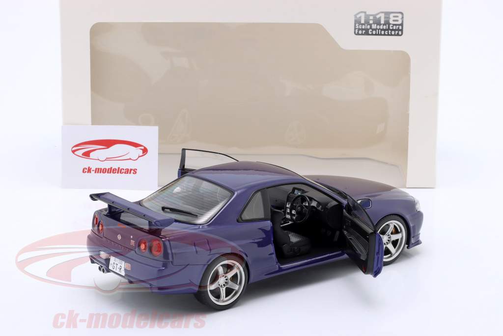 Nissan Skyline GT-R (R34) year 1999 violet 1:18 Solido