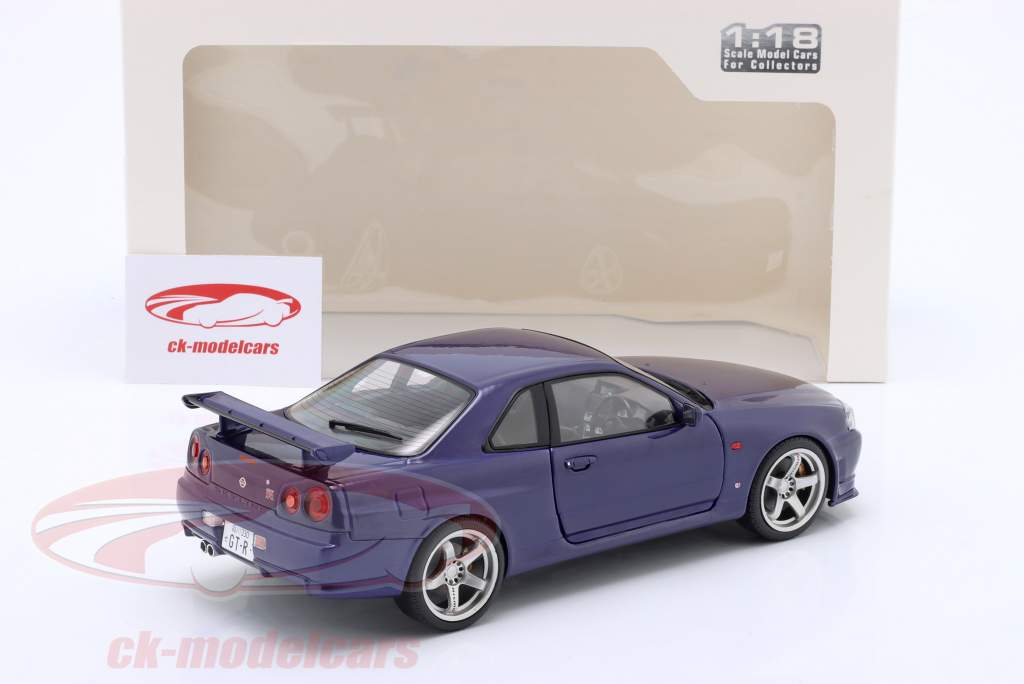 Nissan Skyline GT-R (R34) year 1999 violet 1:18 Solido