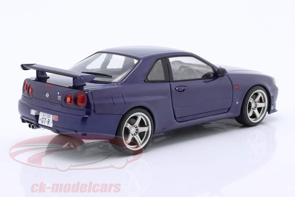 Nissan Skyline GT-R (R34) year 1999 violet 1:18 Solido