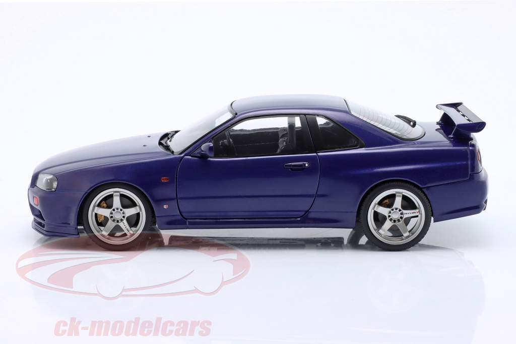 Nissan Skyline GT-R (R34) year 1999 violet 1:18 Solido