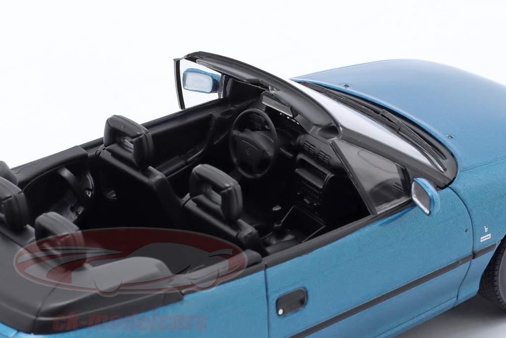 Opel Astra F Cabriolet year 1994 turquoise metallic 1:24 WhiteBox