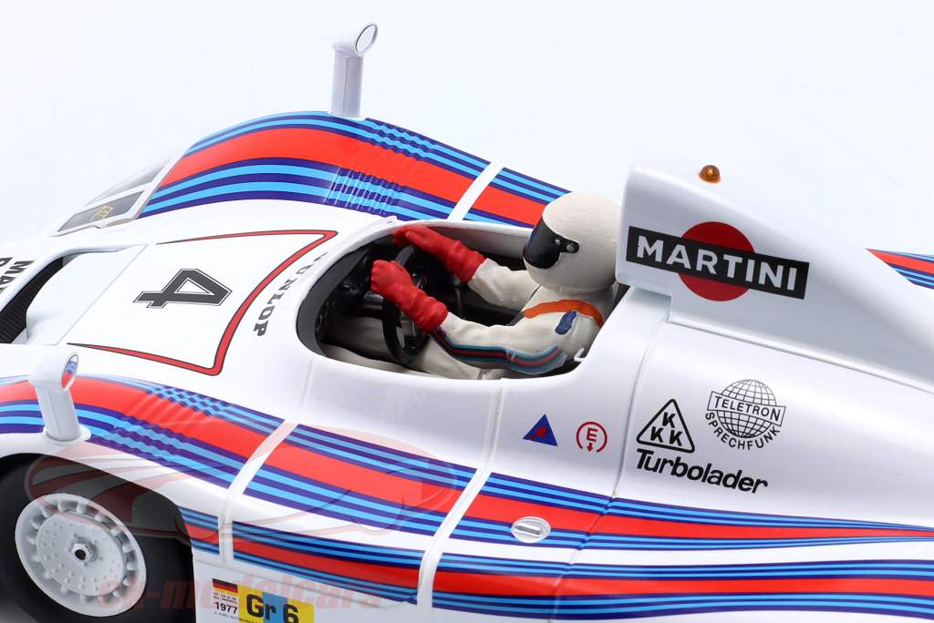 seated person racing driver figure 1977 with white helmet 1:18 FigurenManufaktur