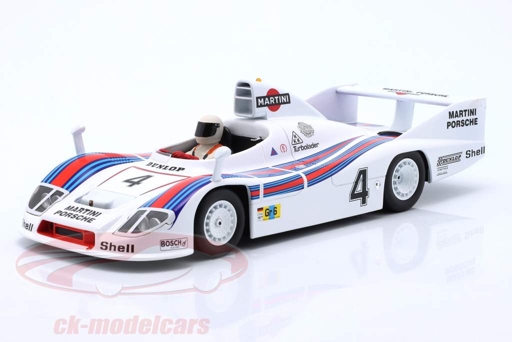 seated person racing driver figure 1977 with white helmet 1:18 FigurenManufaktur