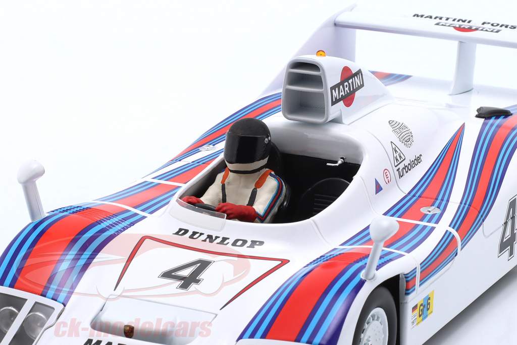 Assis Figurine de pilote de course 1977 avec noir casque 1:18 FigurenManufaktur