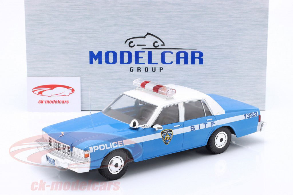 Chevrolet Caprice NYPD Year 1987 blue, white 1:18 ModelCar Group