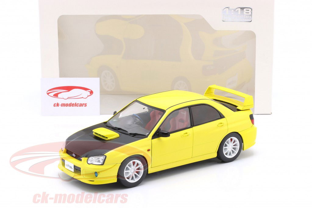 Subaru Impreza WRX STI Baujahr 2003 gelb / schwarz 1:18 Solido