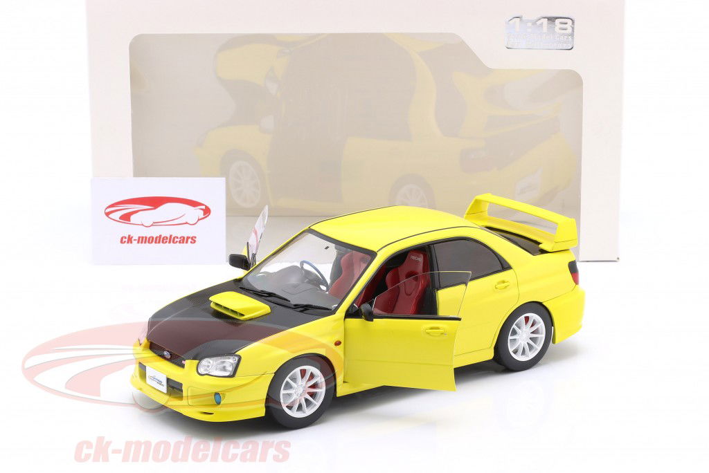Subaru Impreza WRX STI 建造年份 2003 黄色的 / 黑色的 1:18 Solido