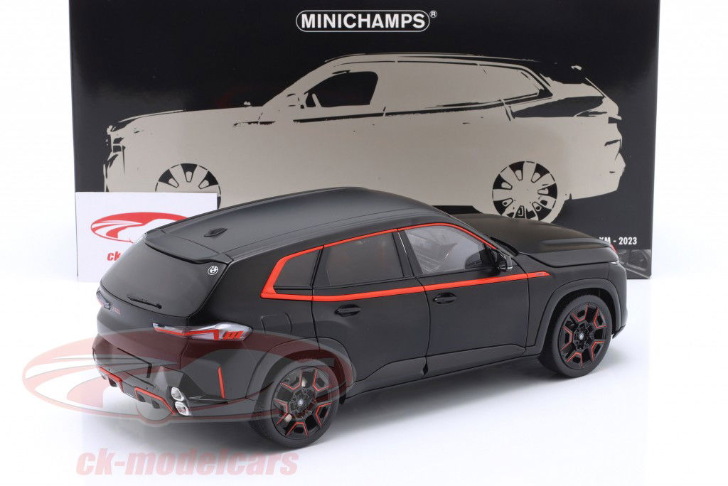 BMW XM (G09) SUV Byggeår 2023 kedelig sort / orange 1:18 Minichamps