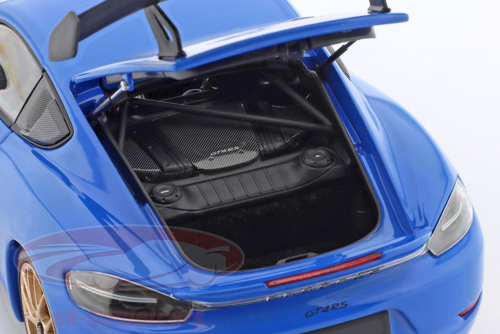 Porsche Cayman GT4 RS med Weissach-pakken Byggeår 2024 blå 1:18 Minichamps