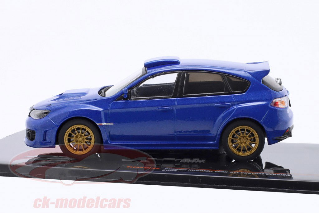 Subaru Impreza WRX STI Anno di costruzione 2009 blu / d'oro cerchi 1:43 Ixo