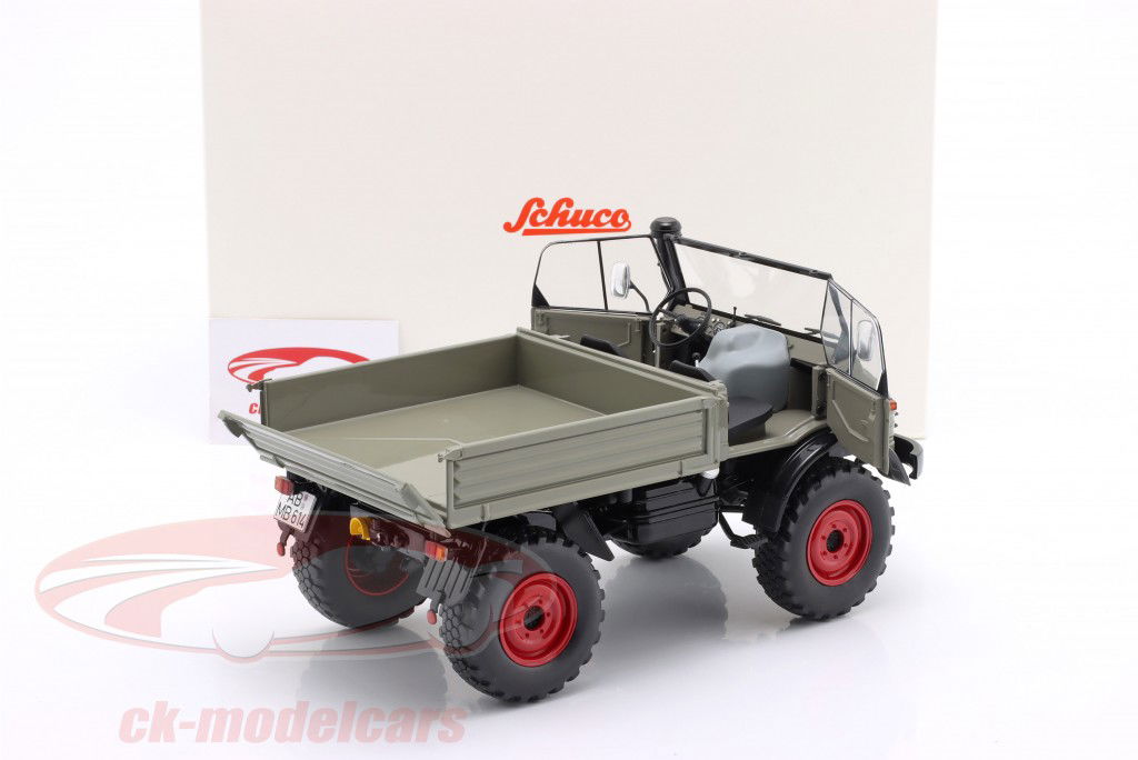 Unimog 406 と ソフトトップ グレー / 赤み リム 1:18 Schuco