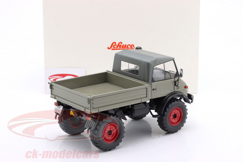 Unimog 406 と ソフトトップ グレー / 赤み リム 1:18 Schuco