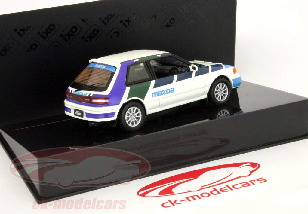 马自达323 GT-AE北京1991年白/蓝1:43 IXO