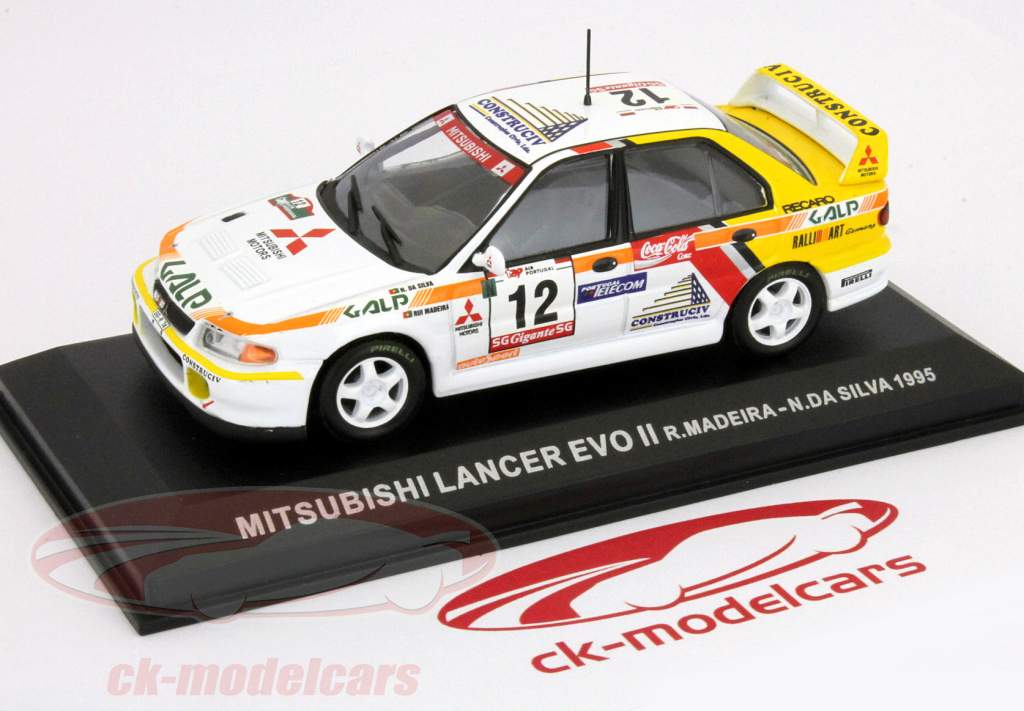 Ixo 1:43 Mitsubishi Lancer Evo white #12 - yellow 1995