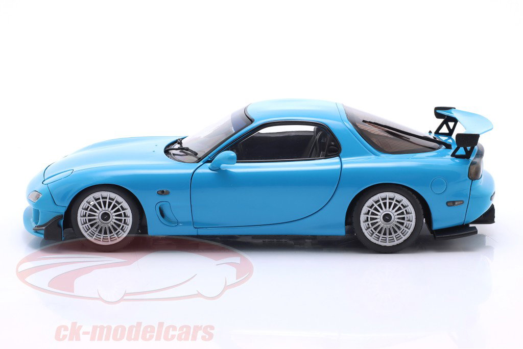 Mazda RX-7 Typ RS (FD3S) Ano de construção 1999 azul neon 1:18 Solido