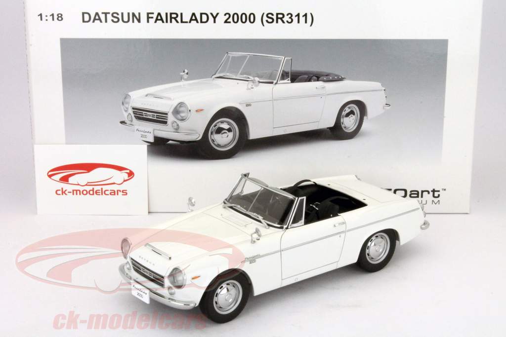Datsun Fairlady 2000 (SR311), построенный в 1967 белого 1:18 AUTOART