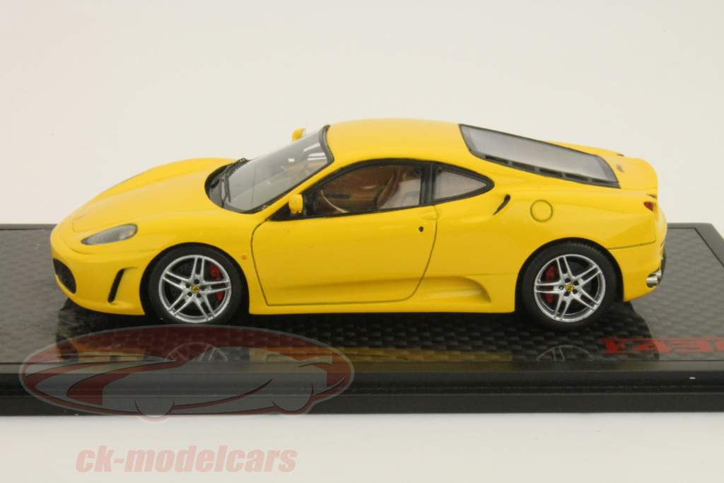 Ferrari F430 2004 года желтые свечи 1:43