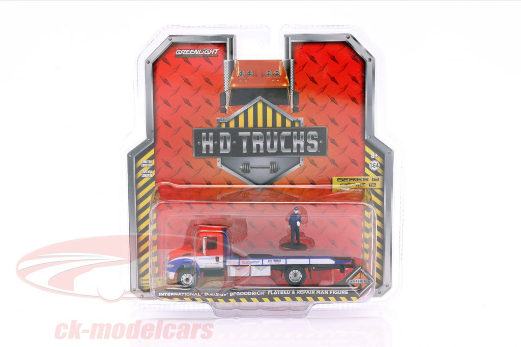 greenlight-1-64-international-durastar-bfgoodrich-flatbed-trailer-with-figure-33120-b/