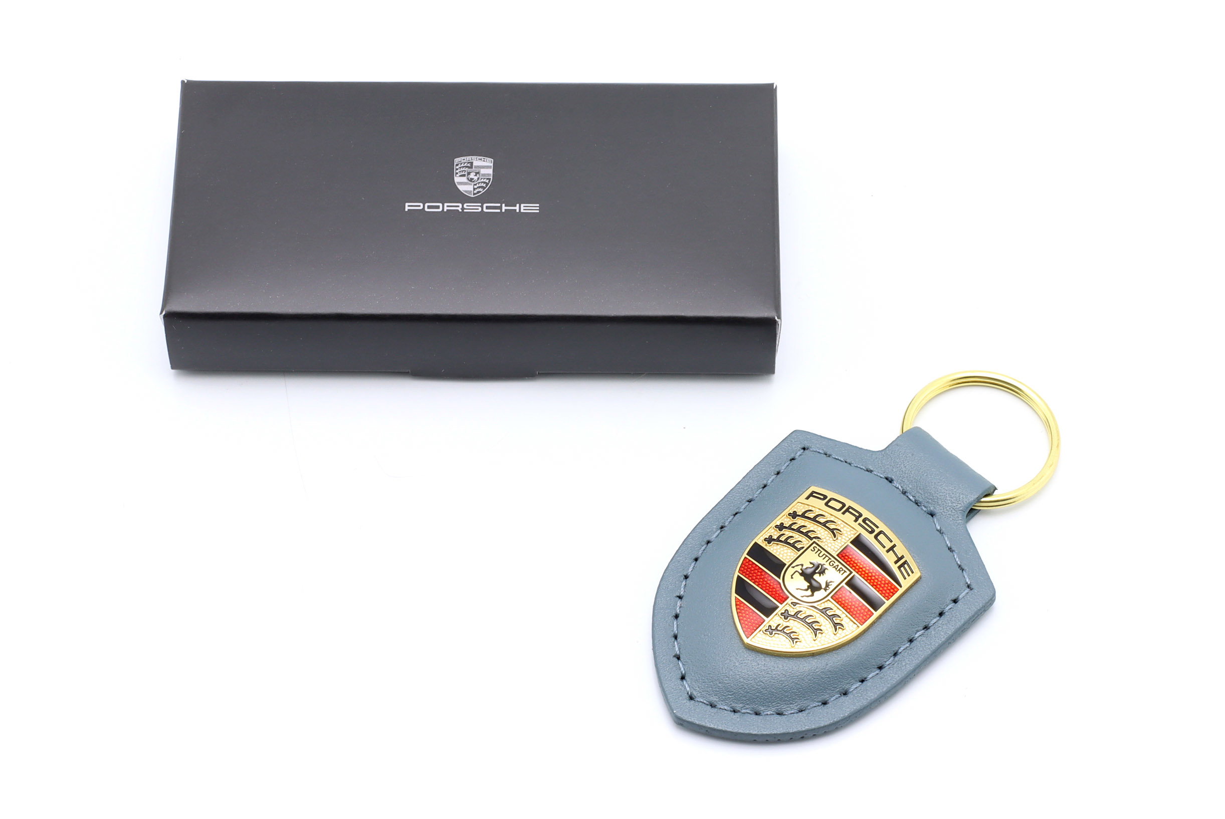 革製キーホルダー Porsche バッジ shoreblue メタリック