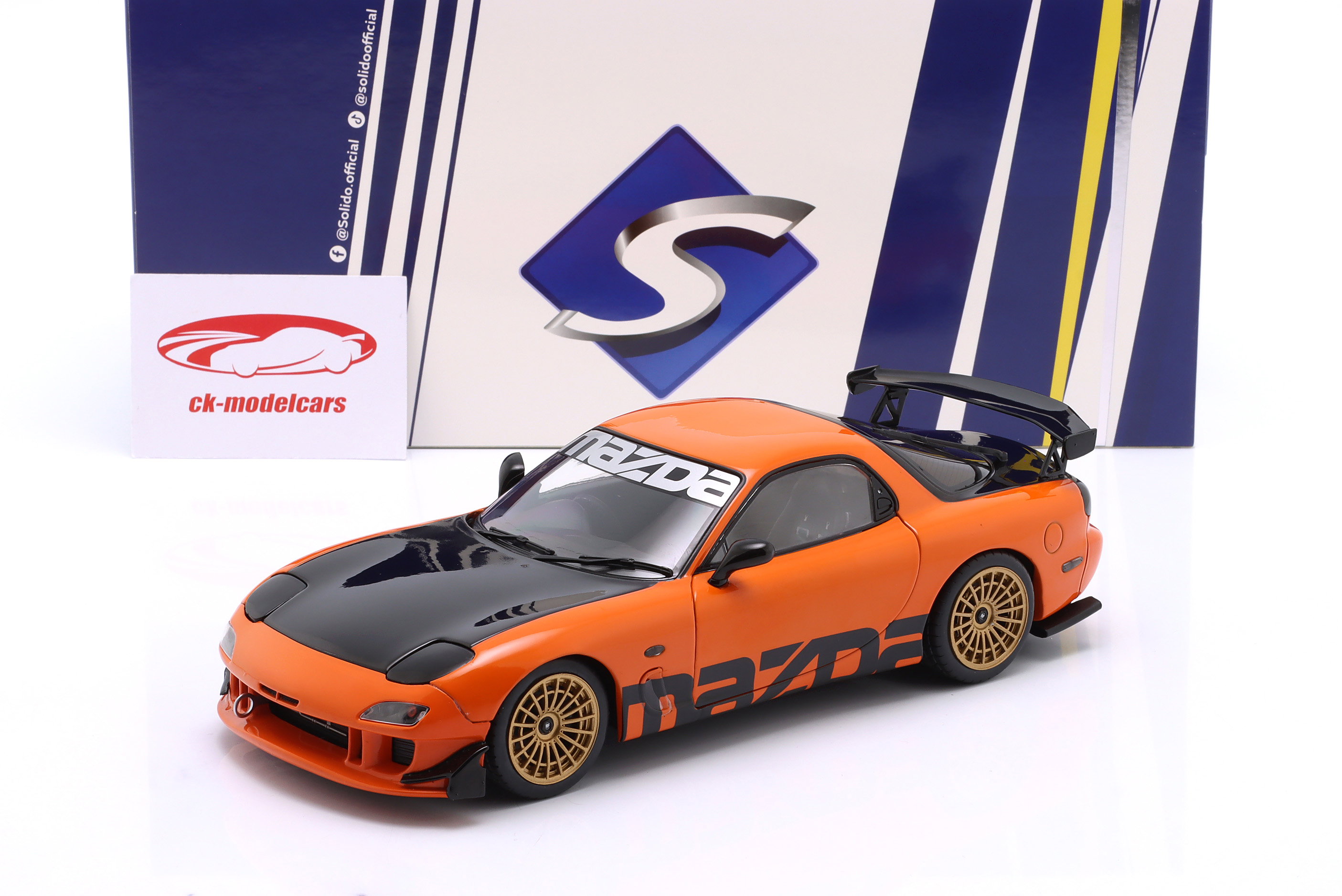 Solido 1:18 Mazda RX-7 类型RS (FD3S) 建造年份1999 橙子/ 黑色的